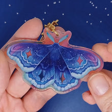 Load and play video in Gallery viewer, Space holographic star moth acrylic keyring