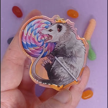 Load and play video in Gallery viewer, Lollipop Opossum holographic acrylic keyring
