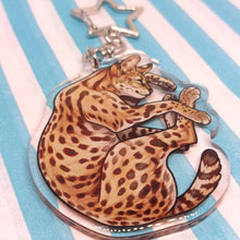 Load image into Gallery viewer, Serval sleepy acrylic keyring
