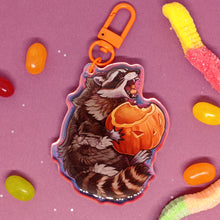 Load image into Gallery viewer, Pumpkin Raccoon holographic acrylic keyring
