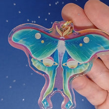 Load and play video in Gallery viewer, Space holographic luna moth acrylic keyring
